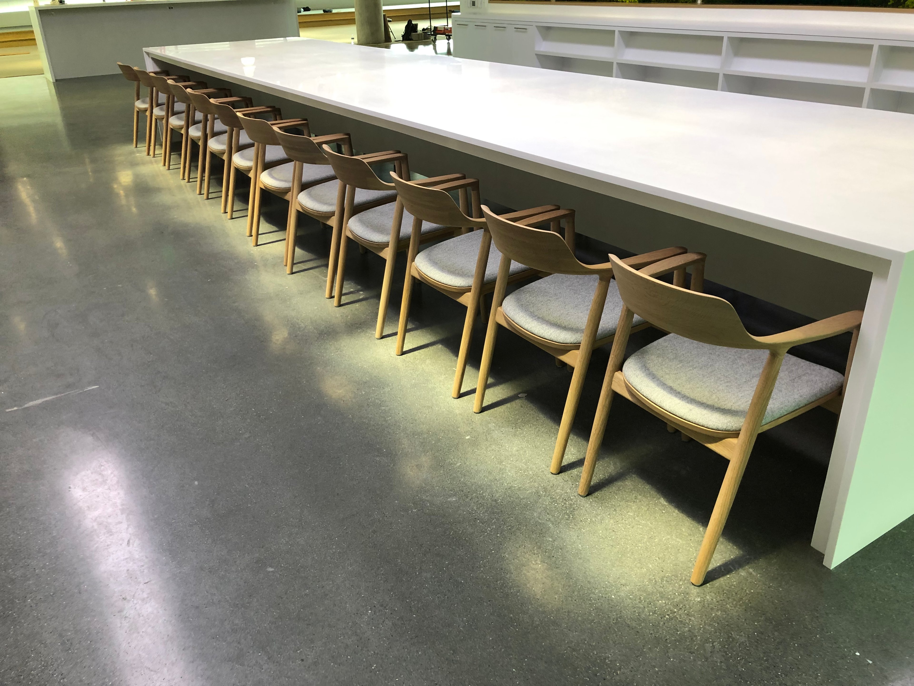 Innerscene Virtual Sun installation case study at Apple Campus in Cupertino California photo of light on white desk and light wood chairs