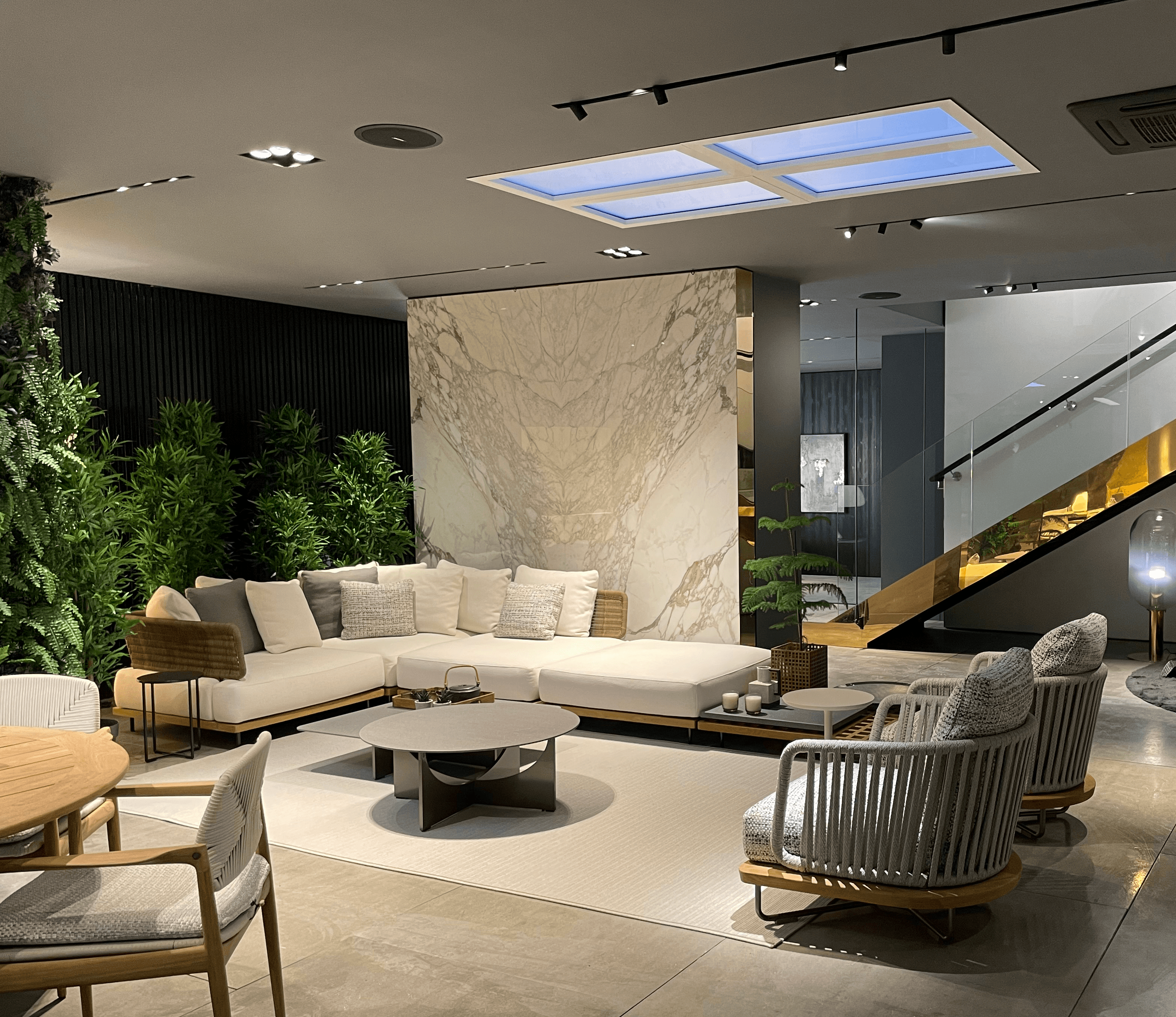 Innerscene Virtual Sun installation case study at Minotti London UK lighting room with with light furniture and marbled wall