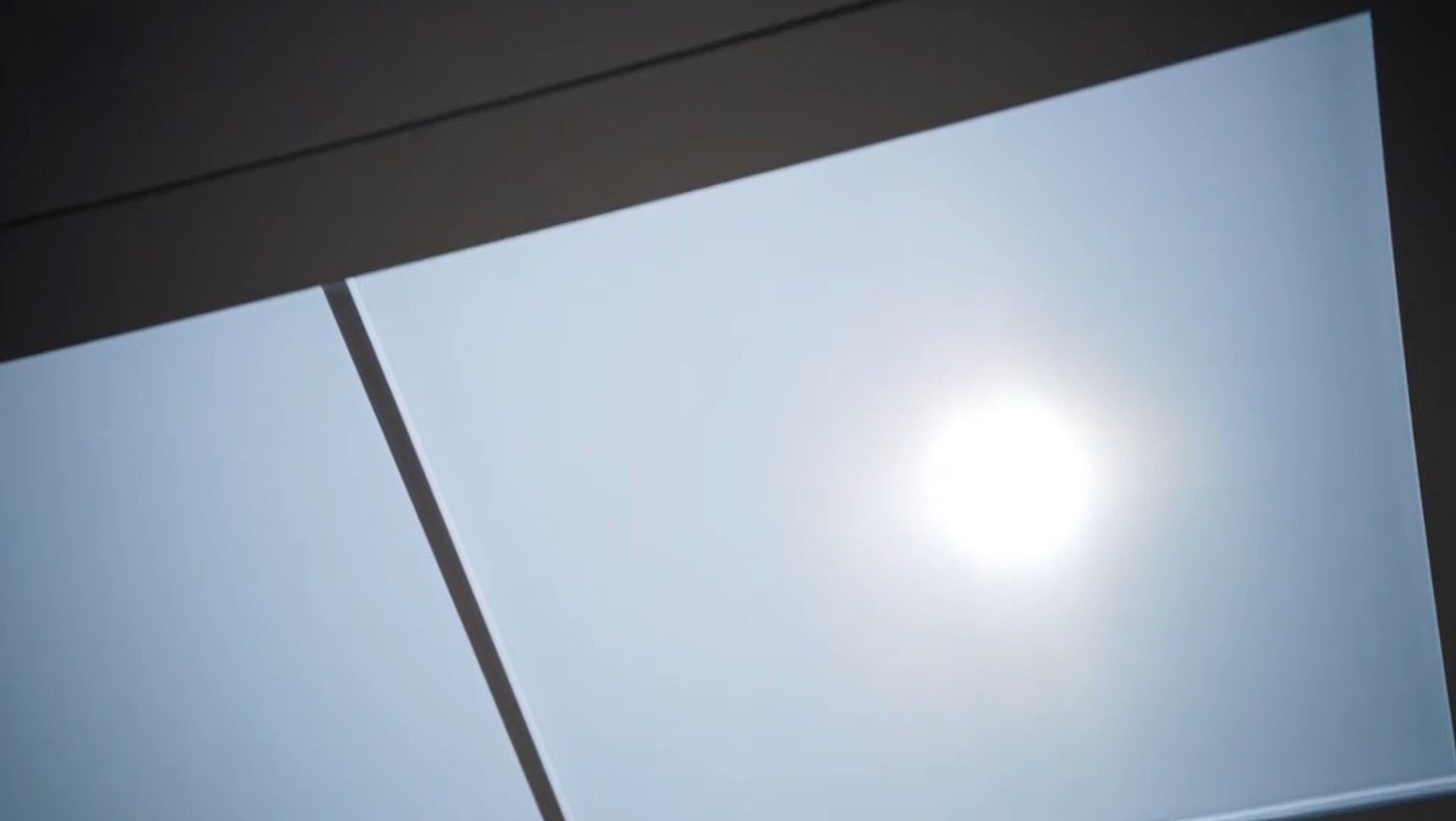 The Innerscene Virtual Sun in Tony Searby's 'House of Healing', showing its sun disc and blue sky in the Grand Designs project