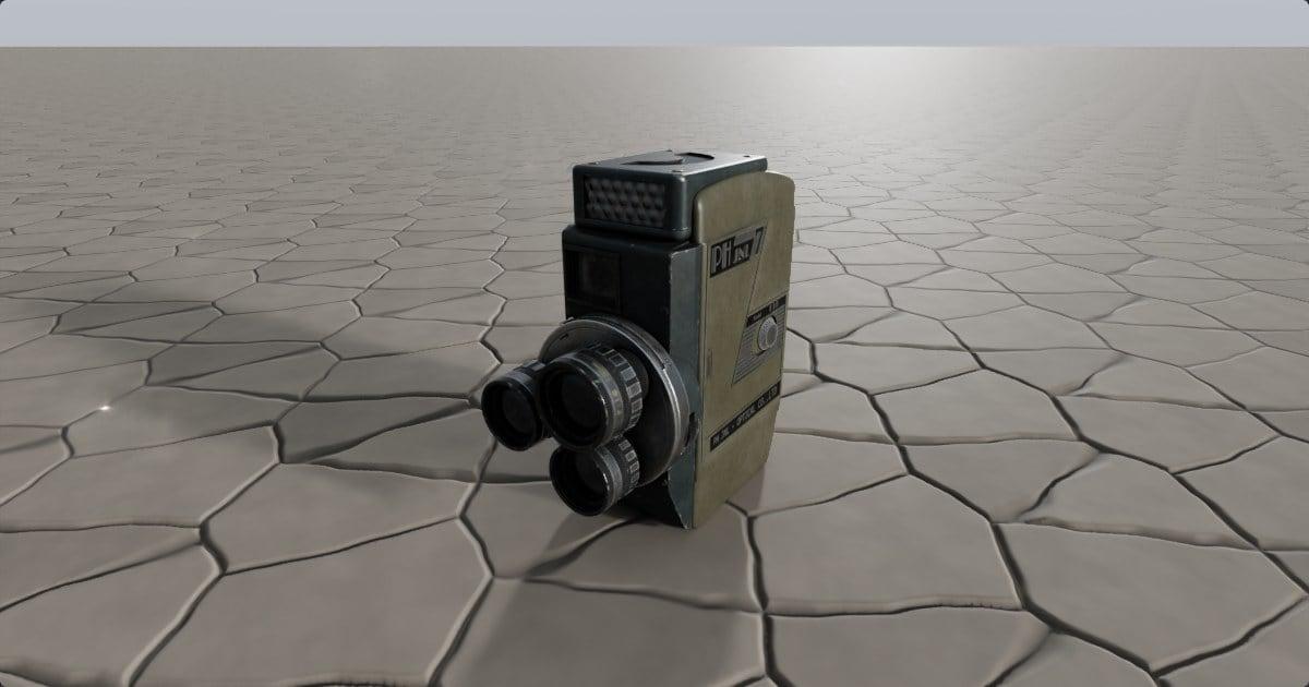 A vintage turret-lens film camera on cracked stone