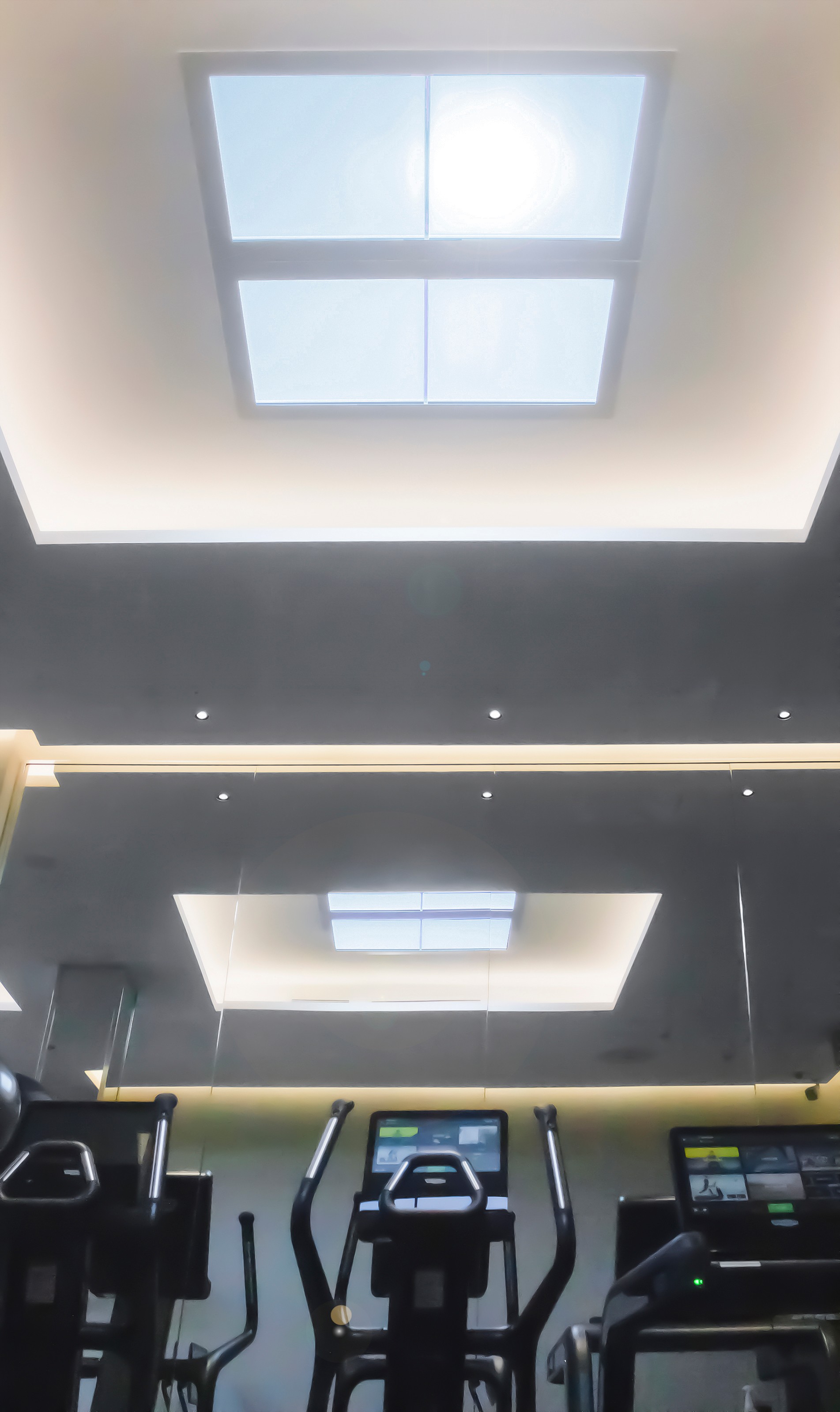 Innerscene installation case study lighting above elliptical machines at Aman Spa The Connaught Hotel London