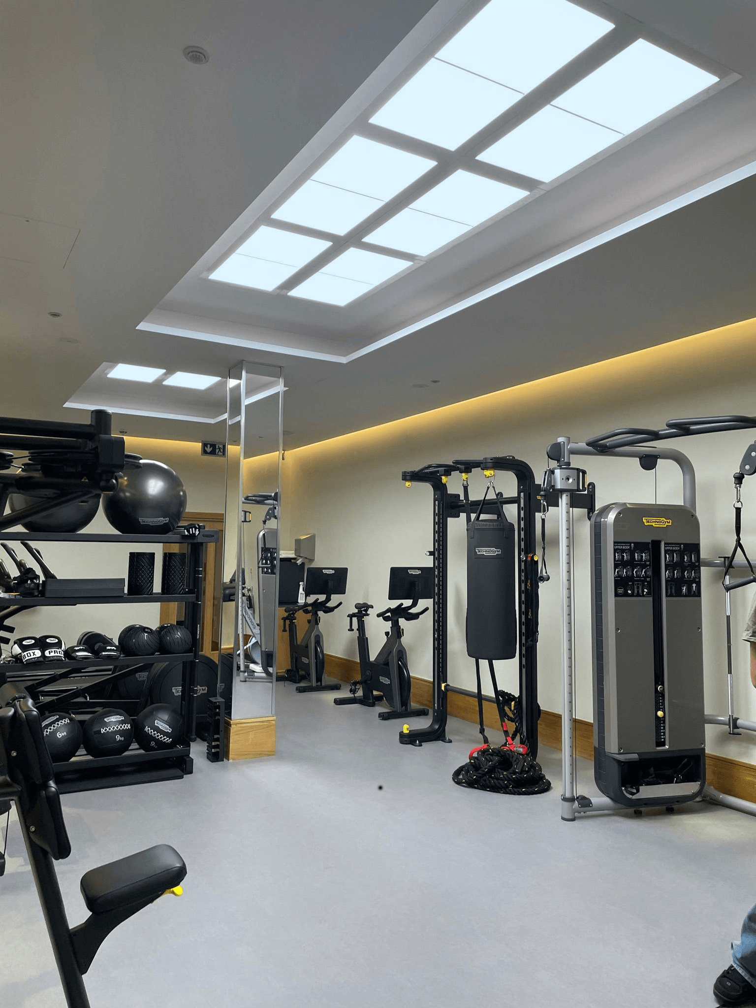 Innerscene installation case study cool lighting above exercise machines at Aman Spa The Connaught Hotel London