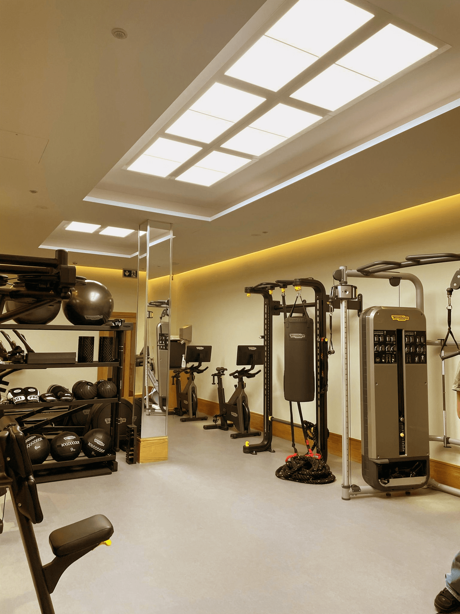 Innerscene Virtual Sun installation case study warm lighting above exercise machines at Aman Spa The Connaught Hotel London